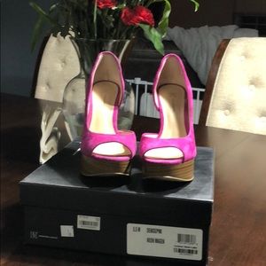 Neon pink pumps